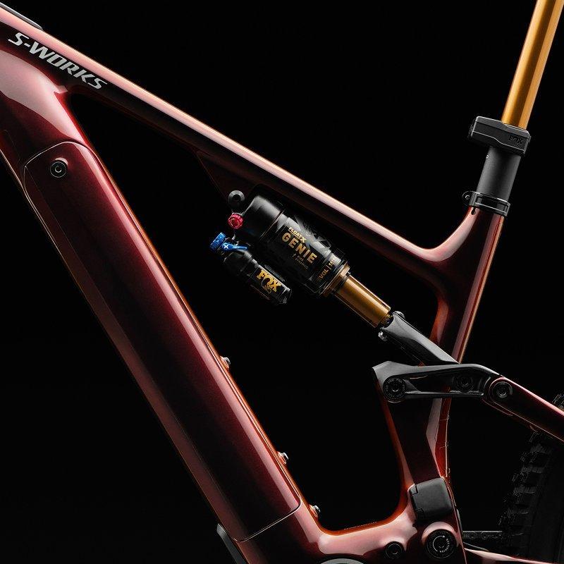 Detailed view of advanced Specialized suspension technology. Rent expertly tuned full-suspension mountain bikes in Verbier for trail confidence.